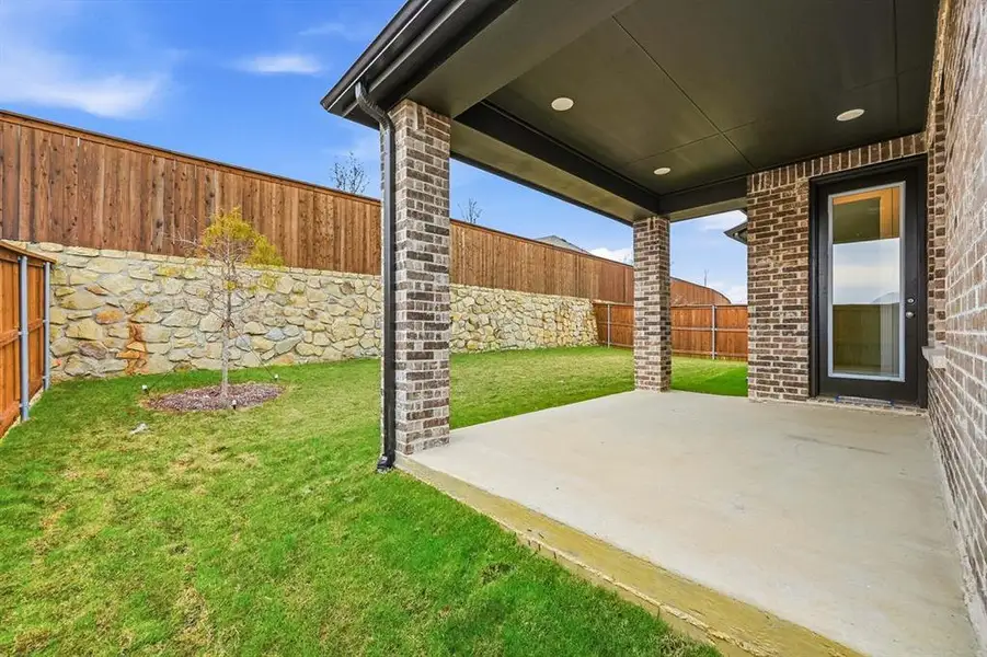Exterior details and patio area of a home in Gateway Village - The Reserve: 50ft. lots, Denison (Image 2).