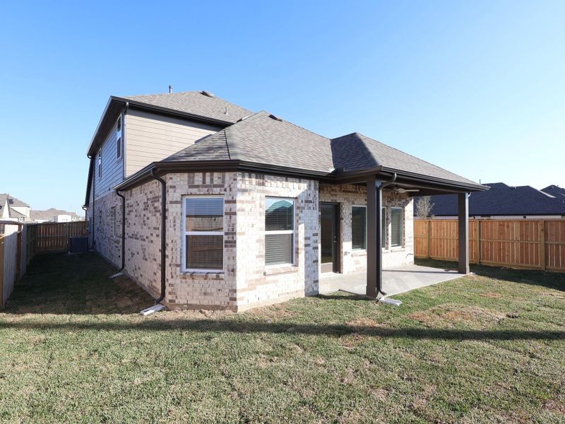 Exterior details and patio area of a home in Marvida, Cypress (Image 3).