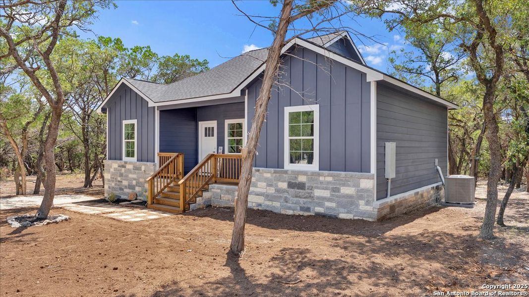 Front exterior of a new home in , Bandera, TX, highlighting curb appeal (Image 17). Front exterior of a new home in , Bandera, TX, highlighting curb appeal (Image 17).