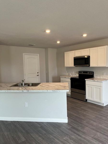 Furnished interior view inside a new home in , Wharton (Image 5).