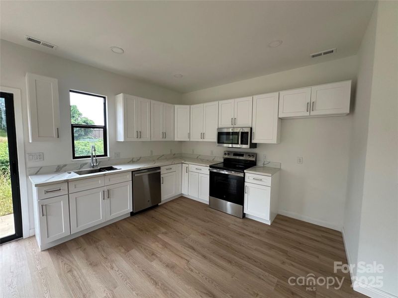 Spacious, unfurnished interior of a new home in , Hickory (Image 4).