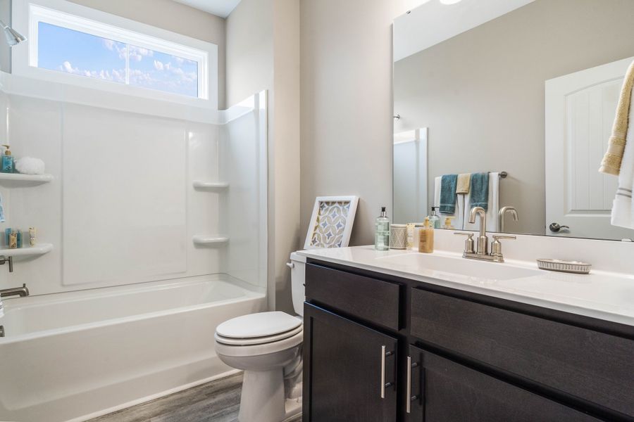Representative furnished interior of a home built from the The Goldenrod by Chesapeake Homes in Bridgewater - Waterside Village, Little River (Image 29).