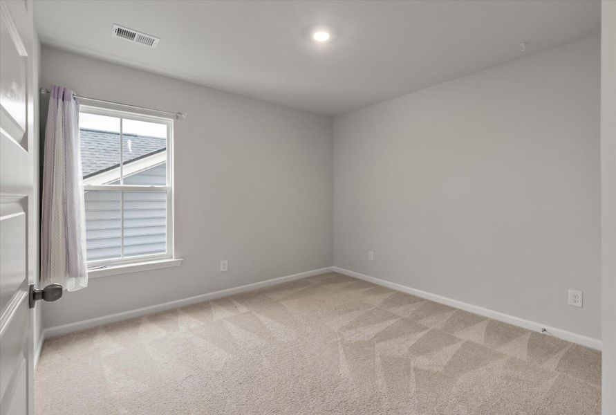 Spacious, unfurnished interior of a new home in Sweetgrass at Summers Corner, Summerville (Image 48).