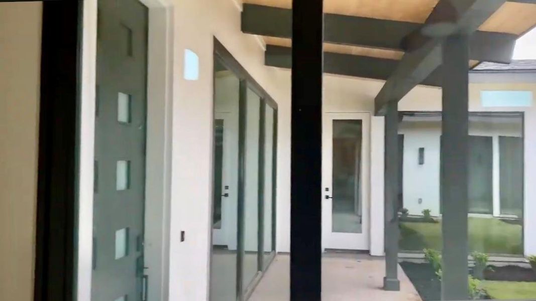 Exterior details and patio area of a home in , Dripping Springs (Image 12).