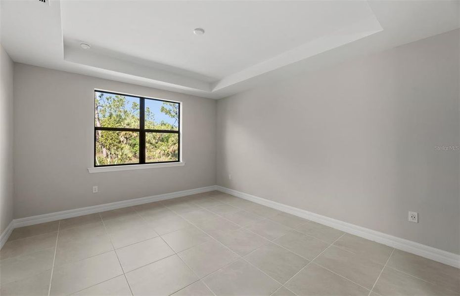 Spacious, unfurnished interior of a new home in Cedar Grove at The Woodlands, North Port (Image 19).