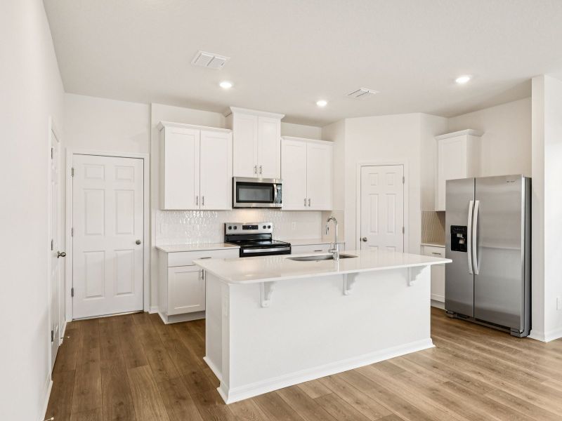 Furnished interior view inside a new home in The Meadow at Crossprairie Bungalows, St. Cloud (Image 4). Furnished interior view inside a new home in The Meadow at Crossprairie Bungalows, St. Cloud (Image 4).