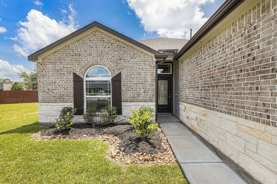 Front exterior of a new home in , Bay City, TX, highlighting curb appeal (Image 23). Front exterior of a new home in , Bay City, TX, highlighting curb appeal (Image 23).