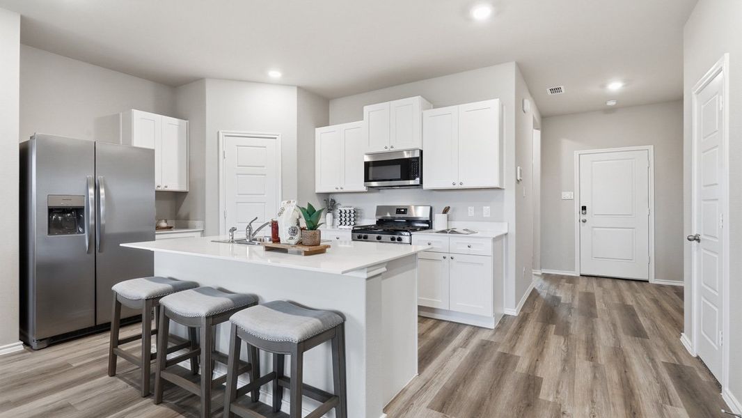 Representative furnished interior of a home built from the Plan by D.R. Horton in Bella Vista, Granbury (Image 3).