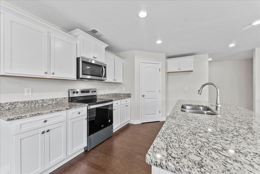 Representative furnished interior of a home built from the Emilia by Enchanted Homes in Guadalupe Heights, Seguin (Image 11).