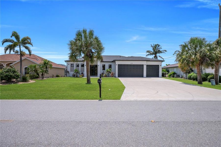 Front exterior of a new home in , Port Charlotte, FL, highlighting curb appeal (Image 1). Front exterior of a new home in , Port Charlotte, FL, highlighting curb appeal (Image 1).