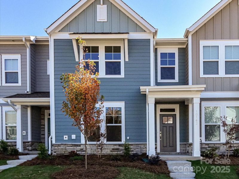 Exterior details and patio area of a home in North Creek Village, Huntersville (Image 23). Exterior details and patio area of a home in North Creek Village, Huntersville (Image 23).