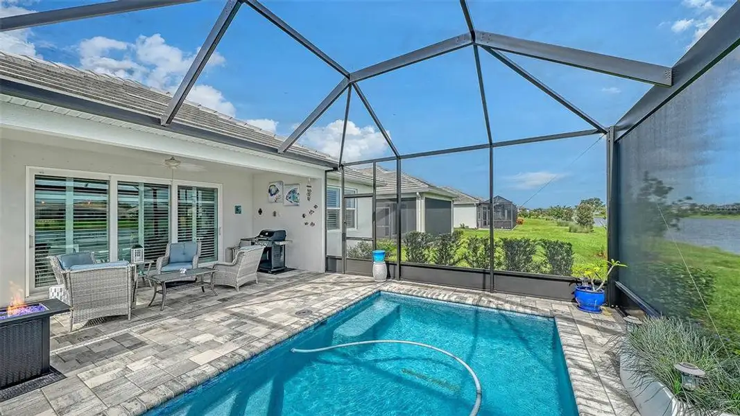 Exterior details and patio area of a home in LakeHouse Cove at Waterside, Sarasota (Image 26). Exterior details and patio area of a home in LakeHouse Cove at Waterside, Sarasota (Image 26).