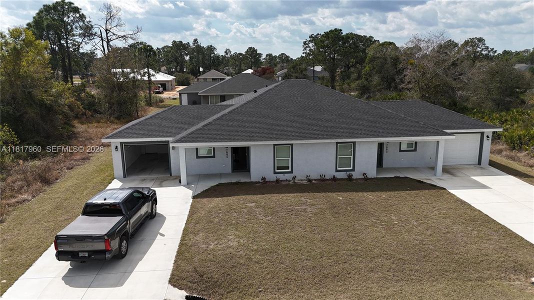 Front exterior of a new home in , Sebring, FL, highlighting curb appeal (Image 23).