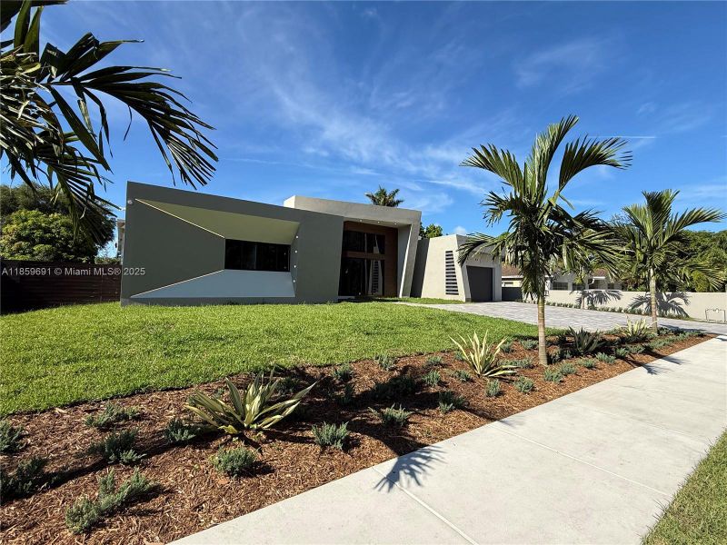 Front exterior of a new home in , Miami, FL, highlighting curb appeal (Image 23).