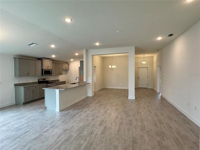 Spacious, unfurnished interior of a new home in Watercress Cove, North Port (Image 4).