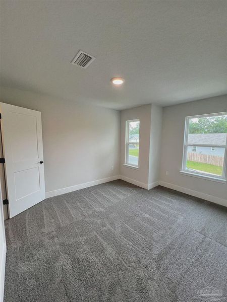 Spacious, unfurnished interior of a new home in Pine Top, Cantonment (Image 12).