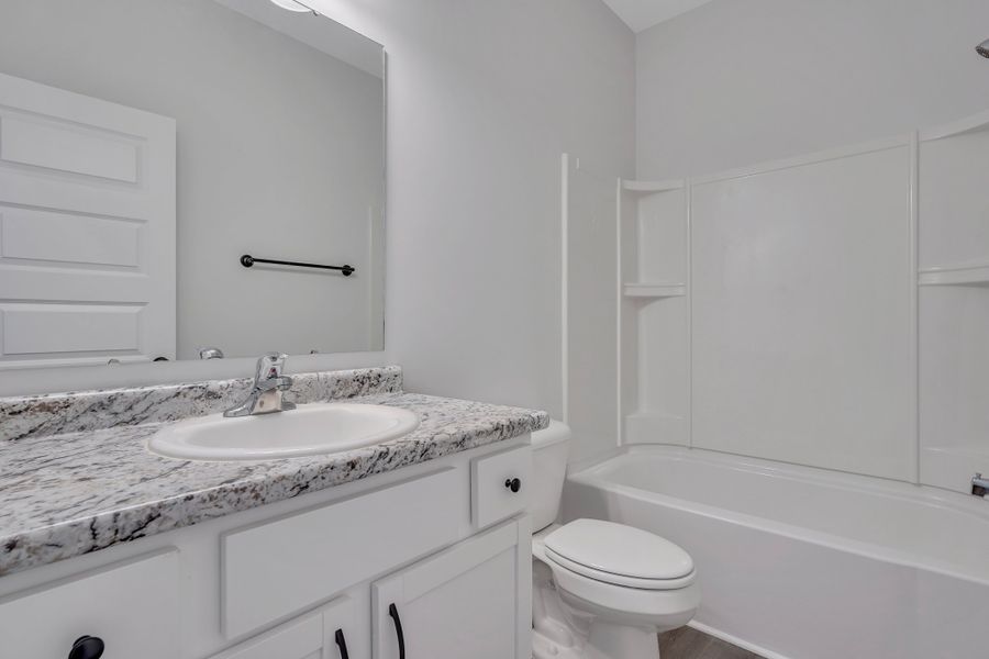 Representative furnished interior of a home built from the The Norman by RTS Homes in Doctor's Creek, Ludowici (Image 4).
