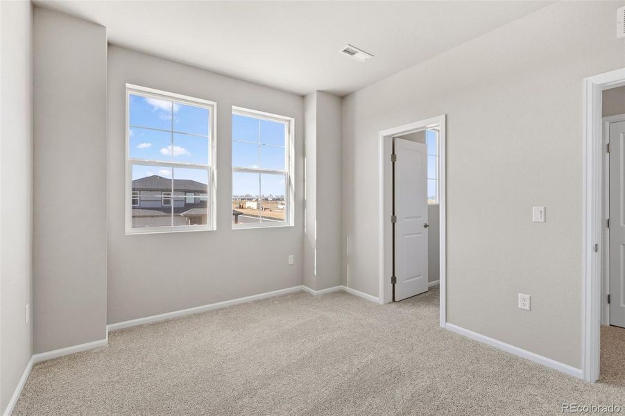 Spacious, unfurnished interior of a new home in Talon Pointe, Thornton (Image 29).