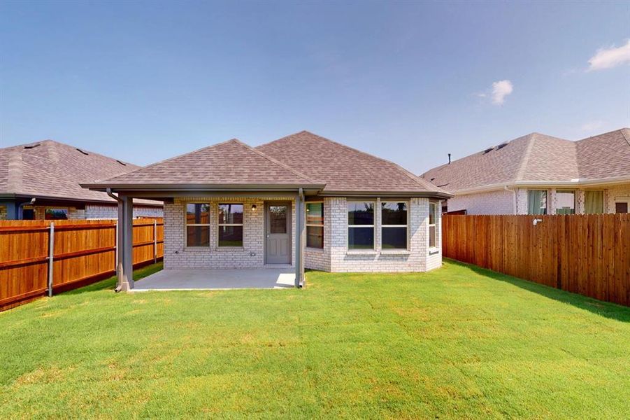 Front exterior of a new home in Elevon, Lavon, TX, highlighting curb appeal (Image 20). Front exterior of a new home in Elevon, Lavon, TX, highlighting curb appeal (Image 20).