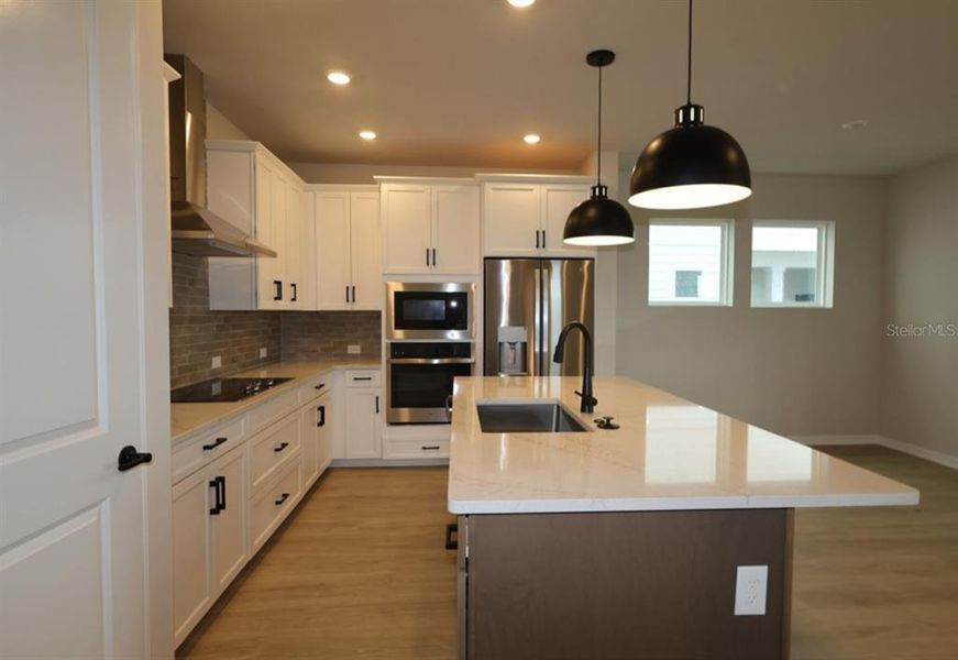 Furnished interior view inside a new home in Weslyn Park in Sunbridge 34', St. Cloud (Image 6). Furnished interior view inside a new home in Weslyn Park in Sunbridge 34', St. Cloud (Image 6).