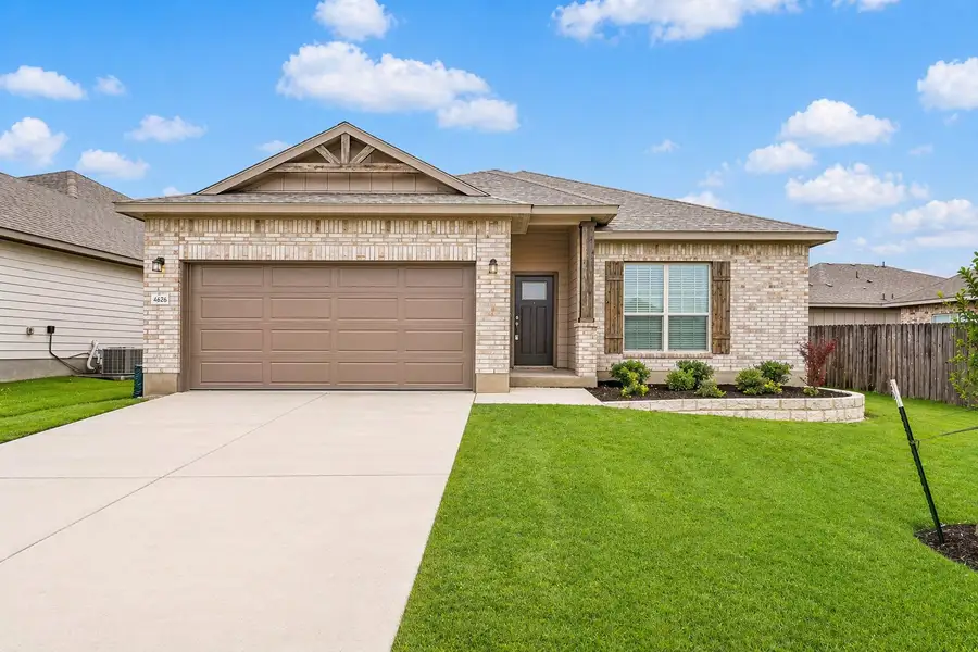 Front exterior of a new home in Three Creeks, Belton, TX, highlighting curb appeal (Image 1). Front exterior of a new home in Three Creeks, Belton, TX, highlighting curb appeal (Image 1).