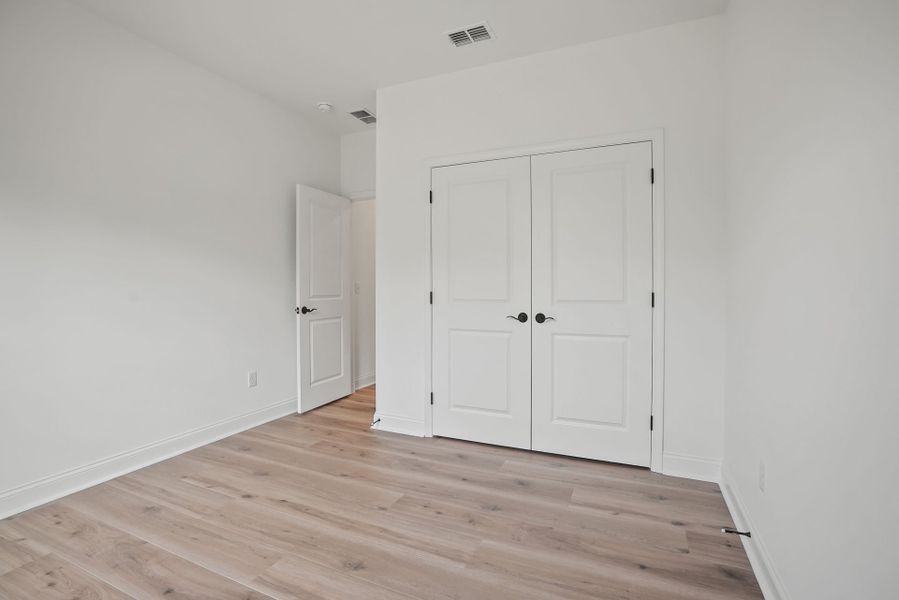 Spacious, unfurnished interior of a new home in Forest Creek, Waxhaw (Image 72).