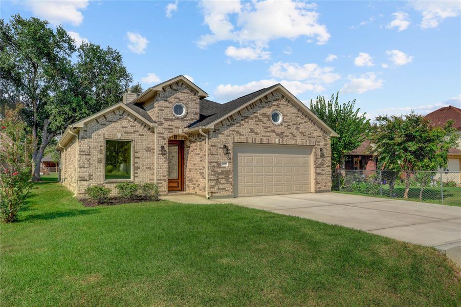 Front exterior of a new home in , Houston, TX, highlighting curb appeal (Image 1).