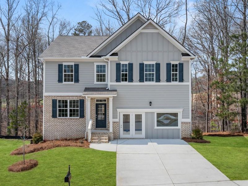 Front exterior of a new home in Lost Creek, Dallas, GA, highlighting curb appeal (Image 2).