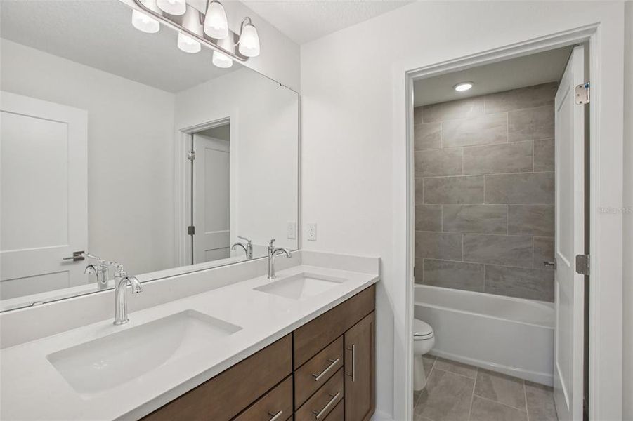 Furnished interior view inside a new home in Grasslands West, Lakeland (Image 10).