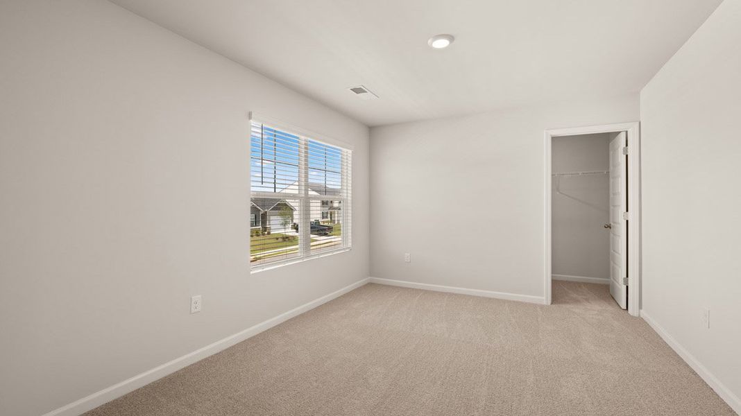 Representative unfurnished interior of a home built from the Grayson by D.R. Horton in Highland Hills, Graniteville (Image 24).