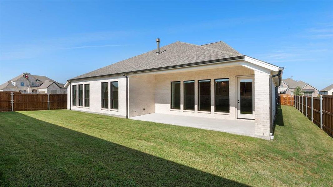 Front exterior of a new home in Terraces 62', Rockwall, TX, highlighting curb appeal (Image 2).