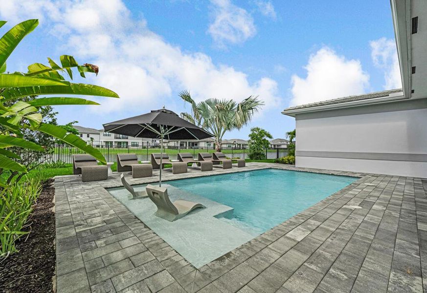 Exterior details and patio area of a home in Apex at Avenir, Palm Beach Gardens (Image 43).