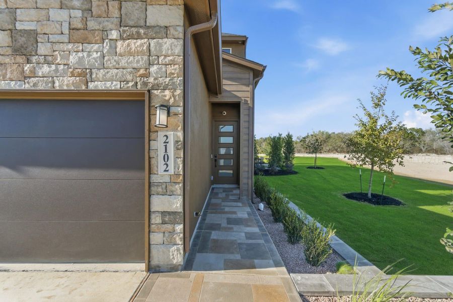 Exterior details and patio area of a home in Prominence, San Antonio (Image 3).