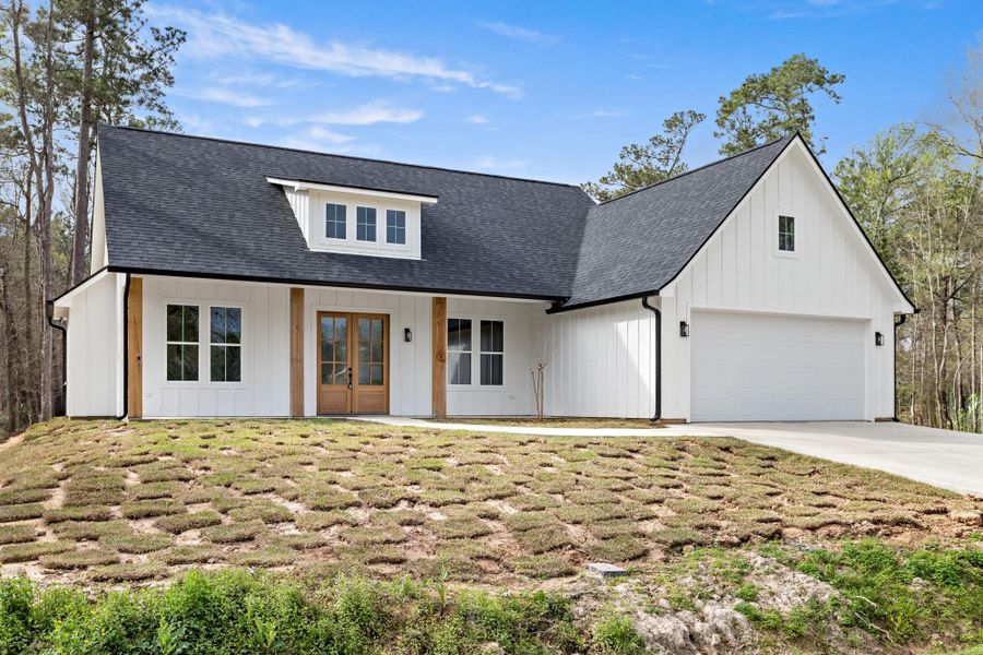 Front exterior of a new home in , Vidor, TX, highlighting curb appeal (Image 23). Front exterior of a new home in , Vidor, TX, highlighting curb appeal (Image 23).