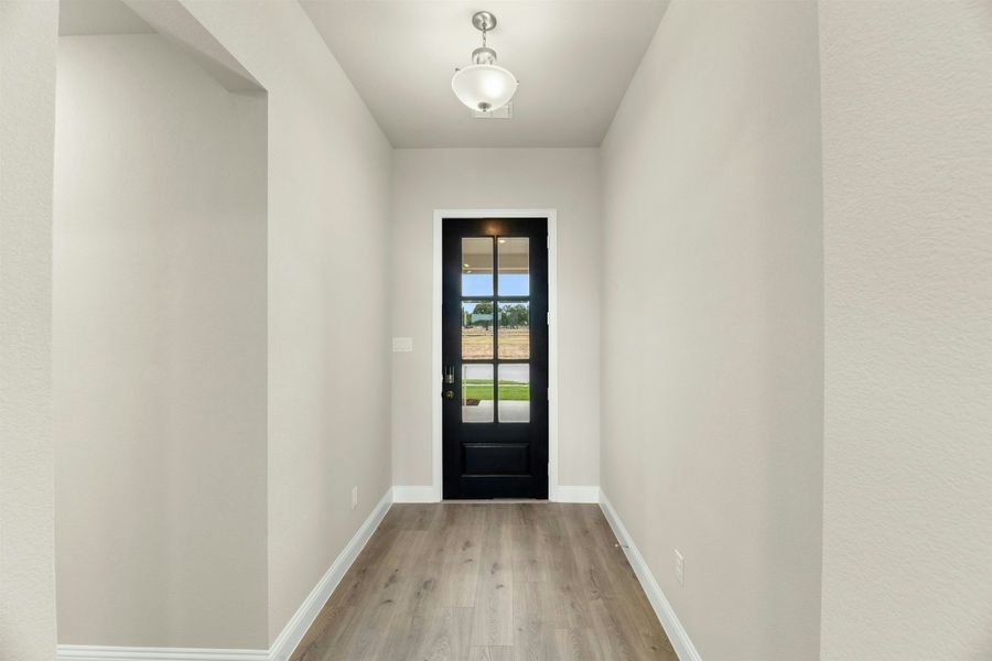 Representative unfurnished interior of a home built from the Bluebonnet by Kindred Homes in Dominion Park, Waxahachie (Image 13).
