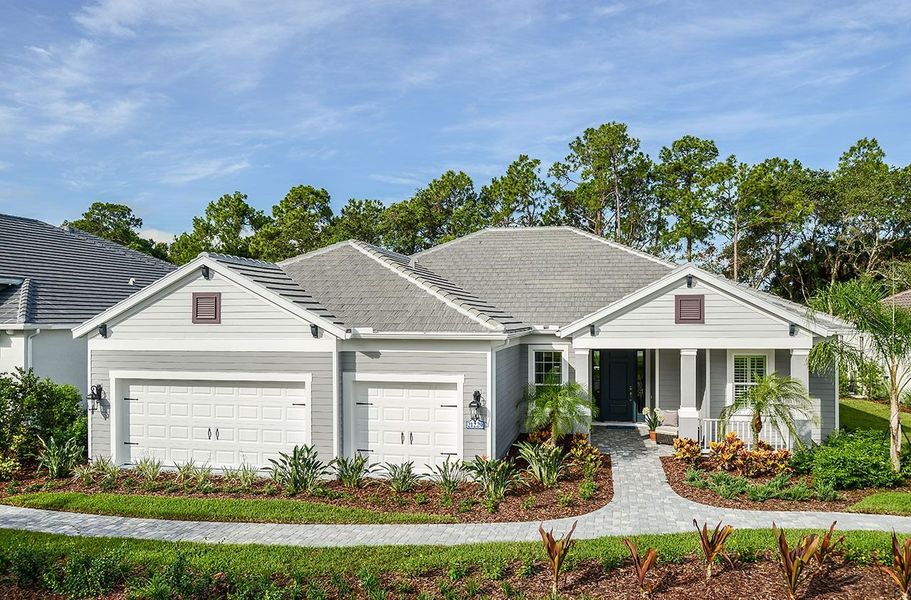 Representative exterior photo of a completed home built from the Captiva by Neal Communities in Grand Palm, Venice, FL (Image 2). Representative exterior photo of a completed home built from the Captiva by Neal Communities in Grand Palm, Venice, FL (Image 2).