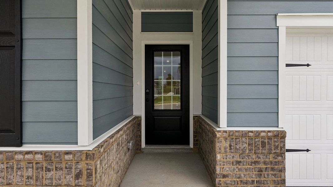 Exterior details and patio area of a home in Reserve at Hickory Ridge, Columbia (Image 3).