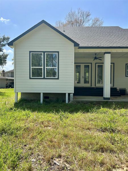Exterior details and patio area of a home in , Conroe (Image 3).