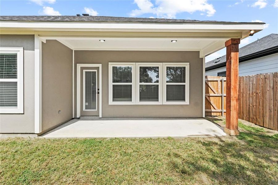 Back of property featuring a patio area and stucco siding Back of property featuring a patio area and stucco siding