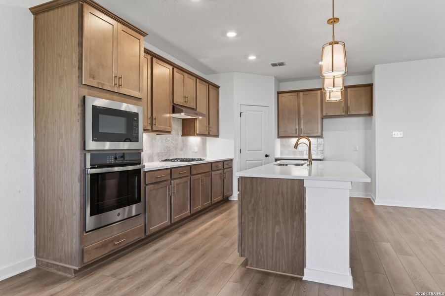 Furnished interior view inside a new home in Nopal Valley, San Antonio (Image 7).