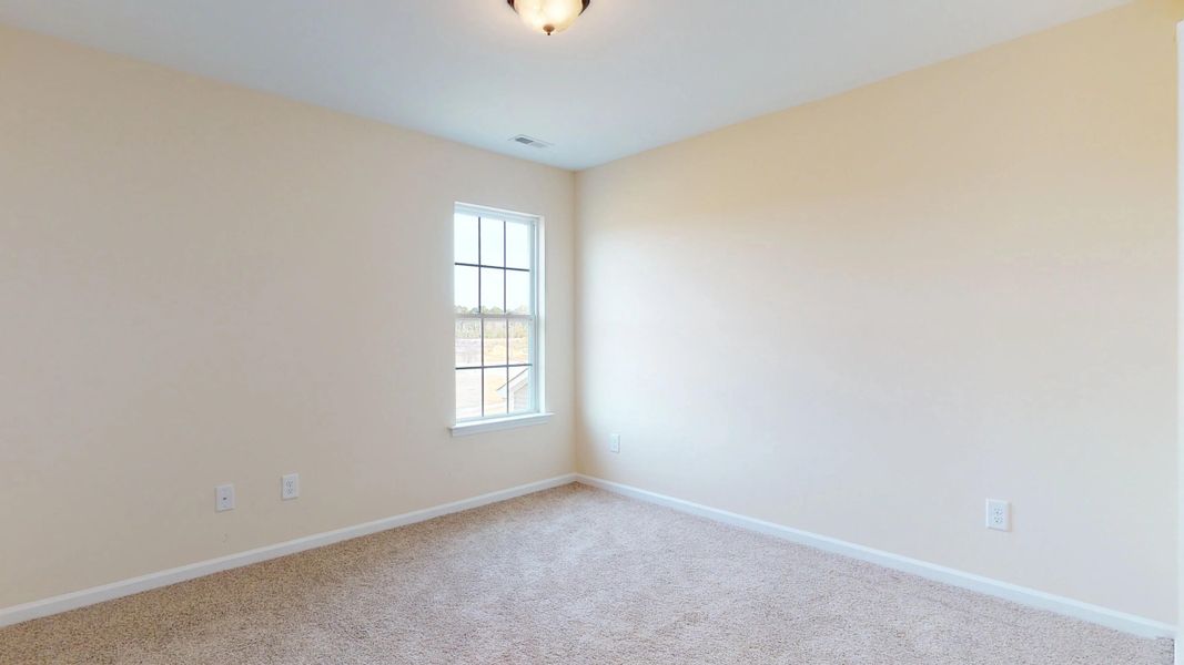 Representative unfurnished interior of a home built from the Rockbridge by Bill Clark Homes in Davenport Farms, Winterville (Image 54).