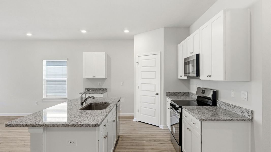 Furnished interior view inside a new home in Hodges Bayou Plantation, Panama City (Image 7).
