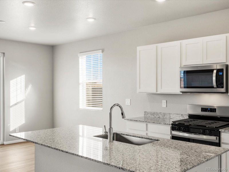 Furnished interior view inside a new home in , Commerce City (Image 10).