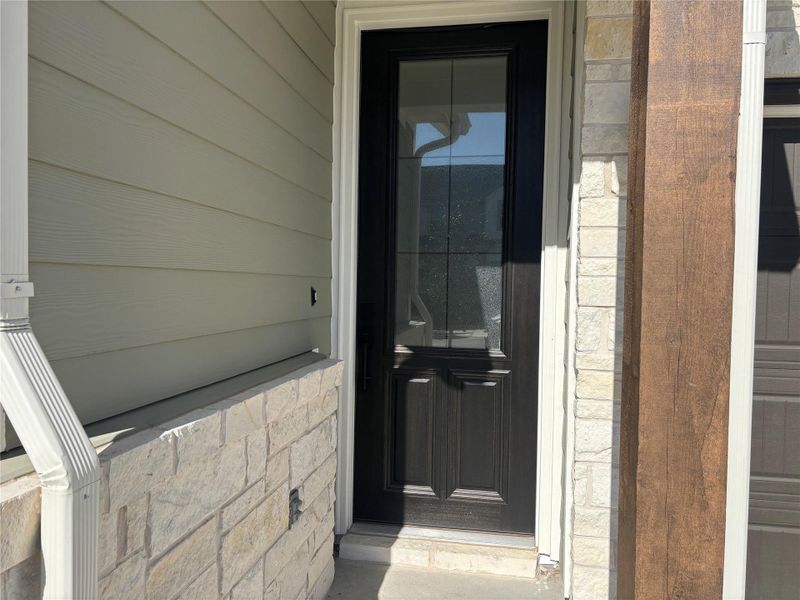 Exterior details and patio area of a home in Cannon Ranch 45s, Dripping Springs (Image 4).