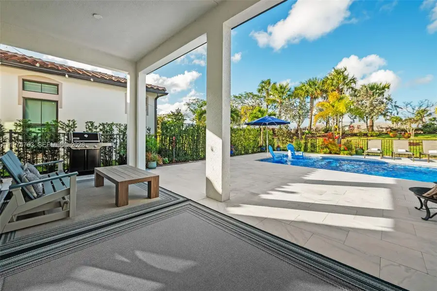 Exterior details and patio area of a home in , Parkland (Image 20).