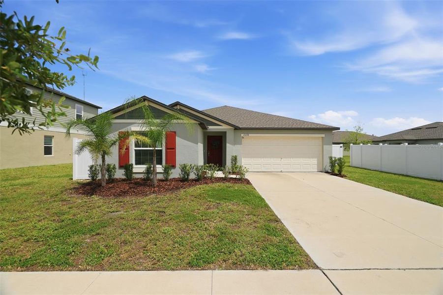 Front exterior of a new home in , Riverview, FL, highlighting curb appeal (Image 2). Front exterior of a new home in , Riverview, FL, highlighting curb appeal (Image 2).