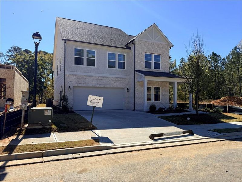 Front exterior of a home in the Arbors at Richland Creek community, located in Buford, GA (Image 8).