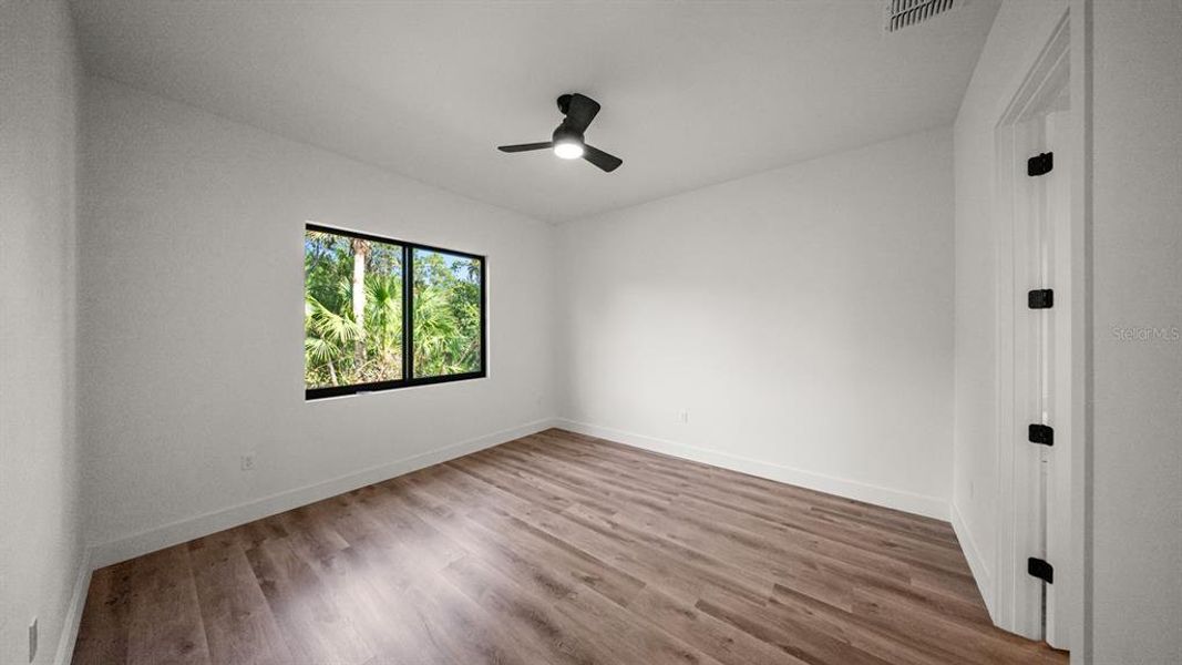Spacious, unfurnished interior of a new home in , Port Charlotte (Image 32).