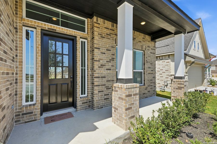 Exterior details and patio area of a home in Prominence Urban, San Antonio (Image 3).