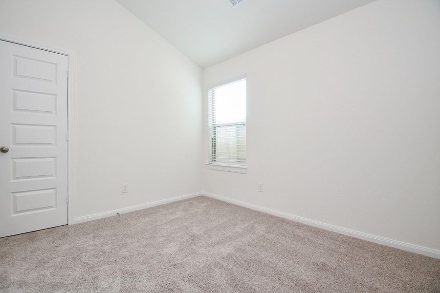 This room has high ceilings, and a spacious closet. This room can be a guest bedroom or an office!